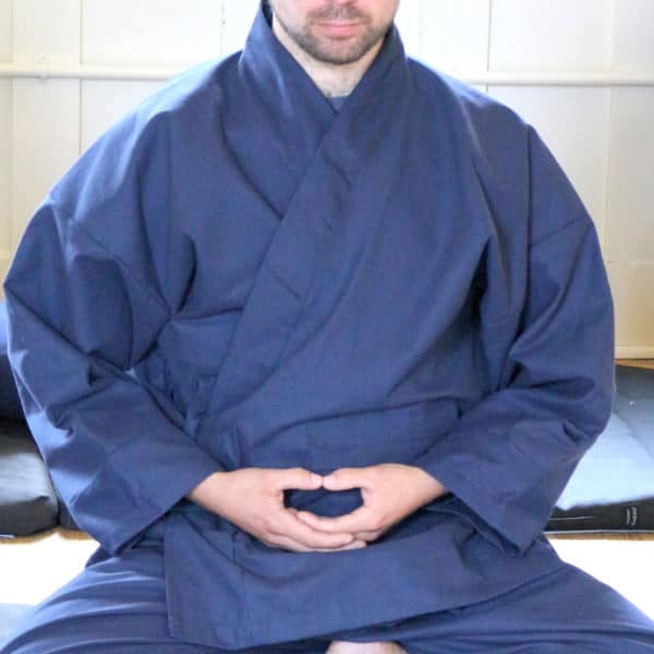 Blue Samue Jacket and pants on seated person, showing meditation position in meditation clothing