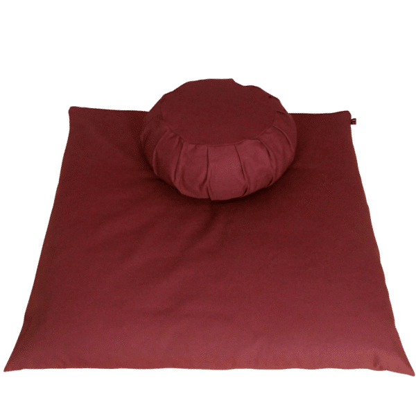 Burgundy meditation cushion set with round zafu and zabuton, perfect for any meditation space.