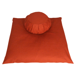 Terra Cotta meditation cushion set with zafu and zabuton, perfect for a home meditation space.