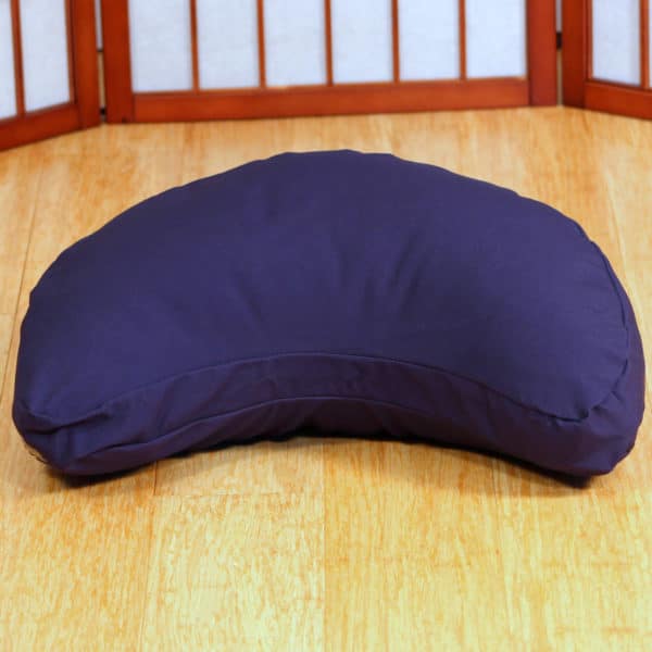 Crescent Zafu meditation cushion in navy in meditation space