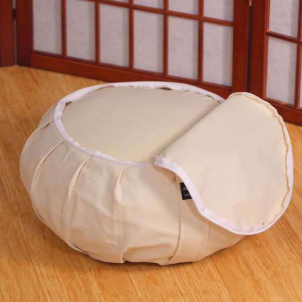 Natural round zafu open with removable, washable outer zafu cover for zafu meditation cushion