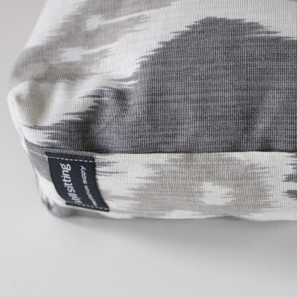Mini Zafu buckwheat meditation cushion in grey ikat close up