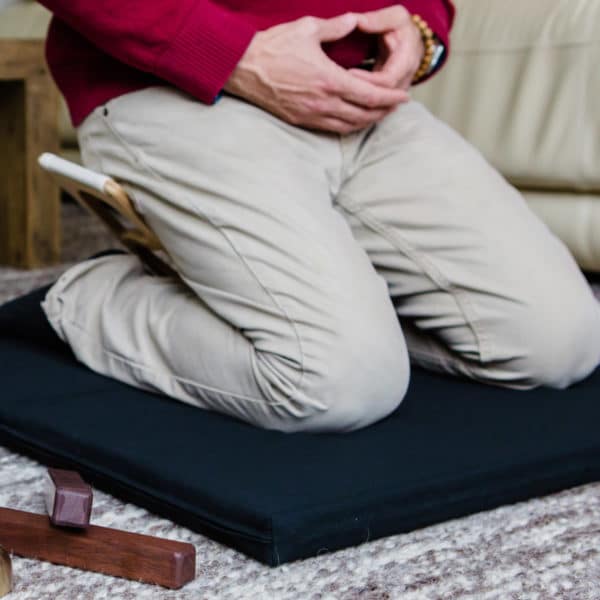 seated seiza or kneeling position for Nomad folding meditation bench