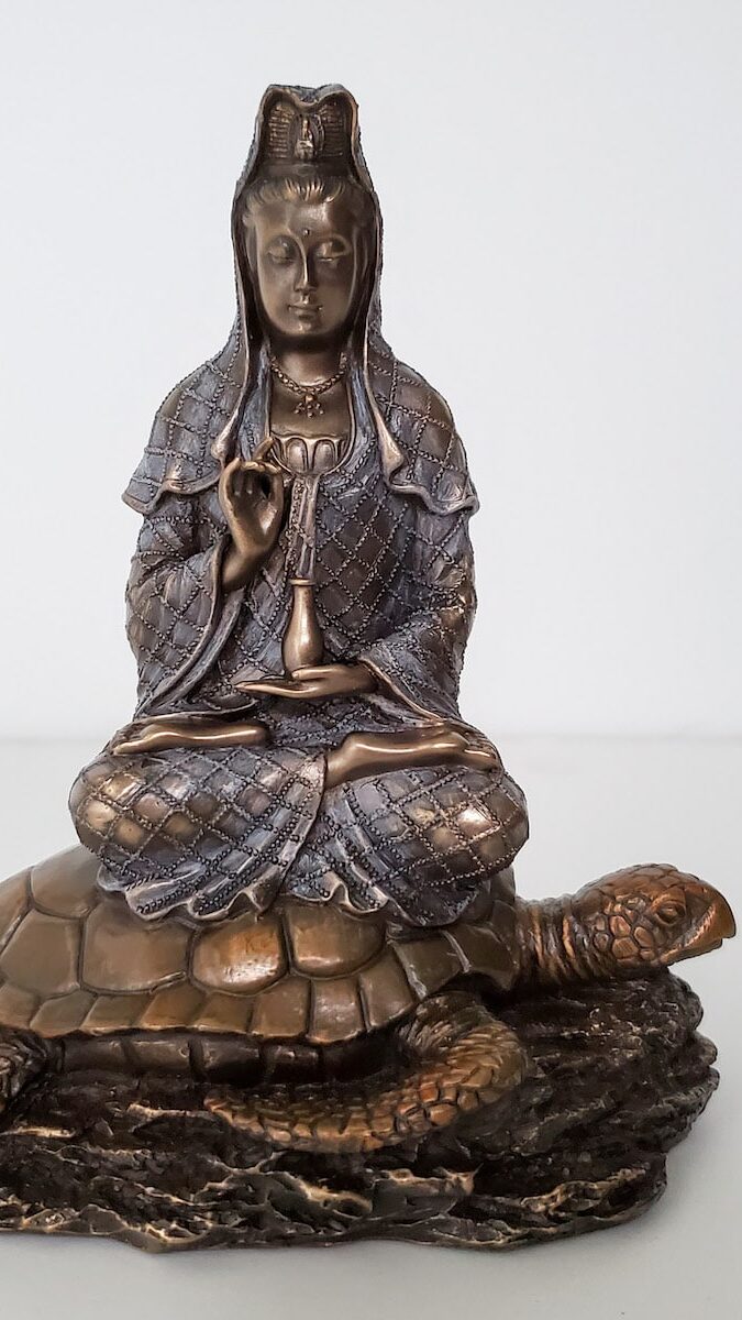 Kuan Yin Statues and and Iconography Still Sitting